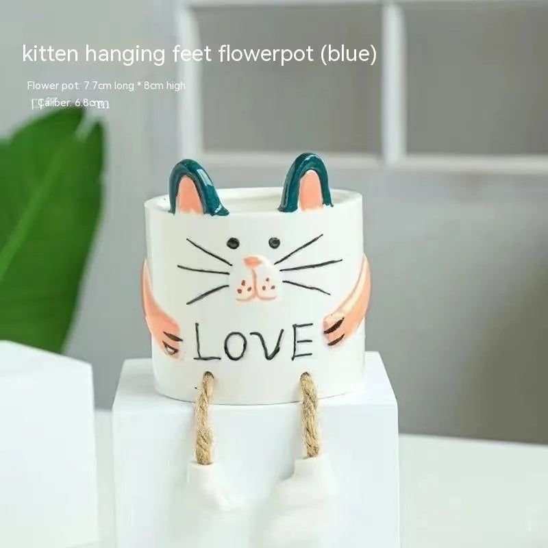 Ceramic hanging foot flowerpot for succulent plants on desktop