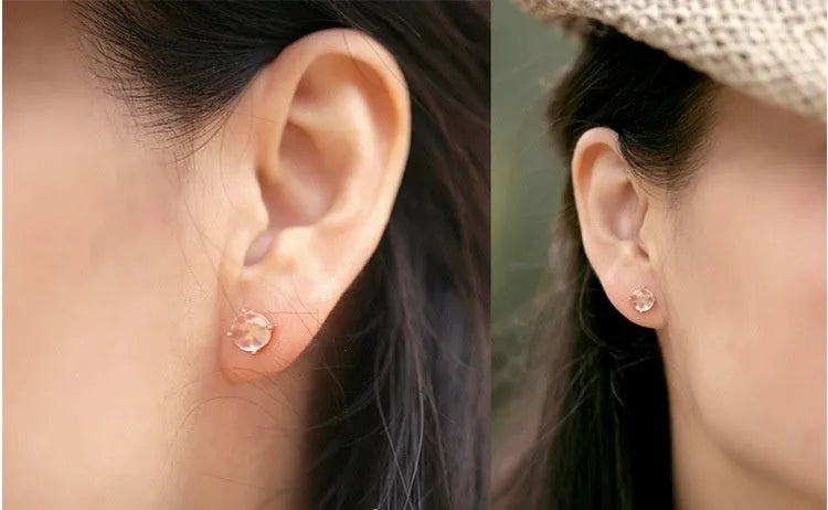 Women's rose gold drop-shaped stud earrings with synthetic Ross quartz and crystal inlay detail
