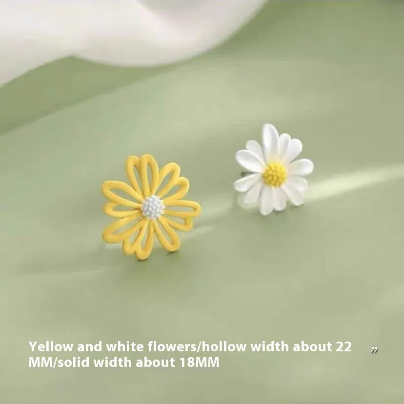 A pair of cartoon-style flower stud earrings in alloy, showing a blue and orange two-tone colour variant.