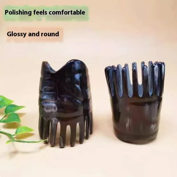 Black buffalo horn comb with wide teeth and fine teeth for head massage.