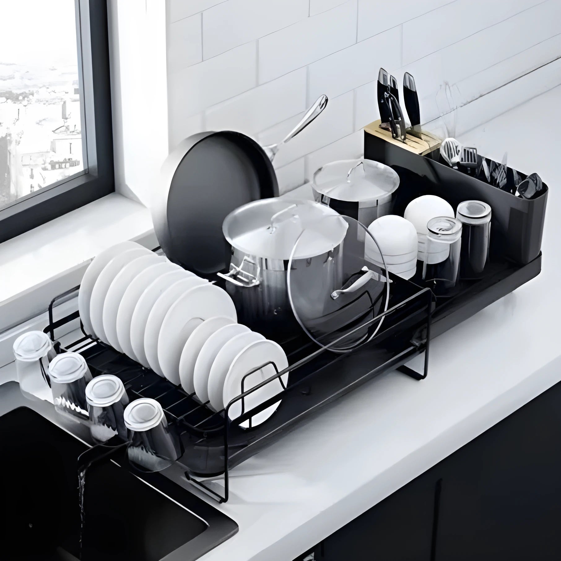 Retractable foldable kitchen dish rack with a detachable cutlery cup, made from carbon steel.