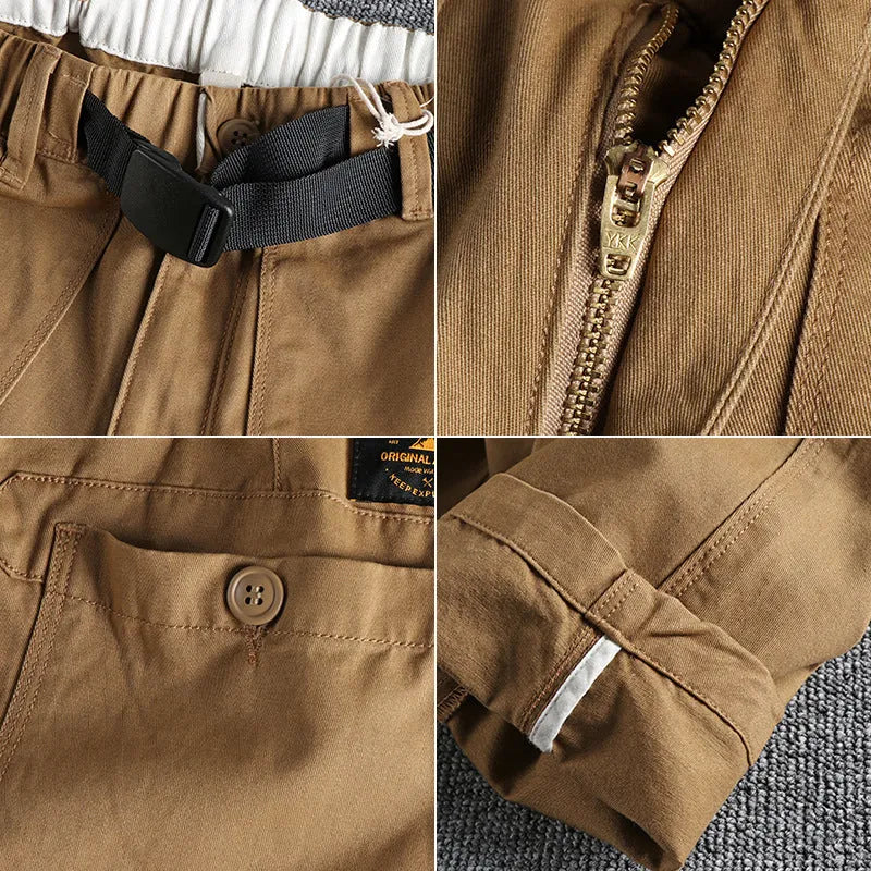 Men's khaki and dark blue cotton casual trousers with a mid-waist fit and zip fly.