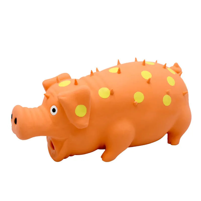 Pig-shaped latex dog chew toy with squeaker in various colours, 20cm long