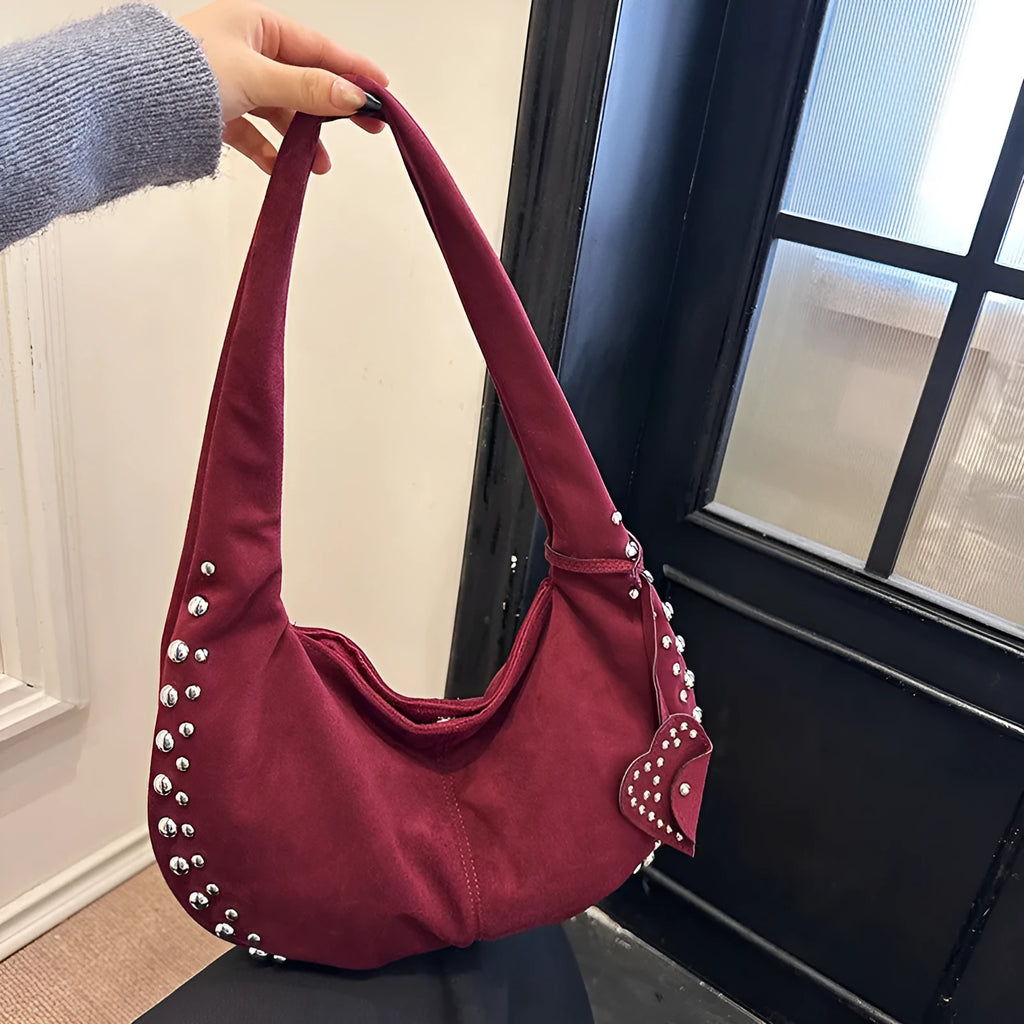 Soft plush retro tote handbag for women in a choice of colours, shown with strapless underarm carry.