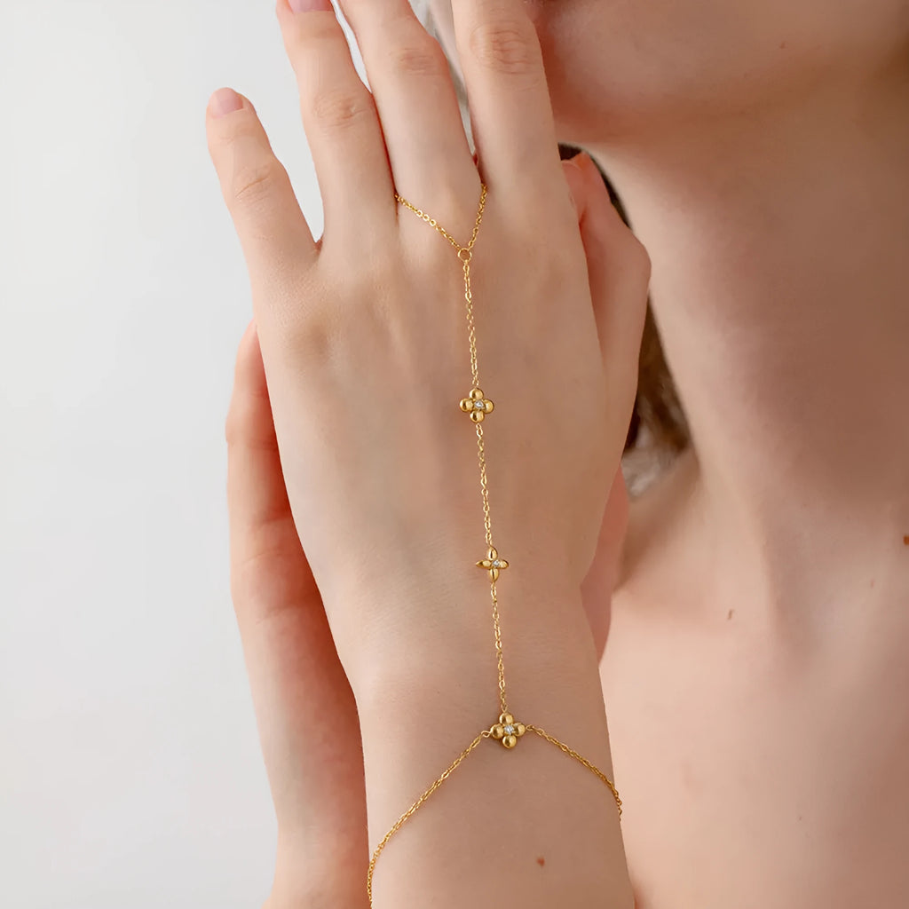 Gold stainless steel bracelet with eight-pointed stars and floral geometric design for women