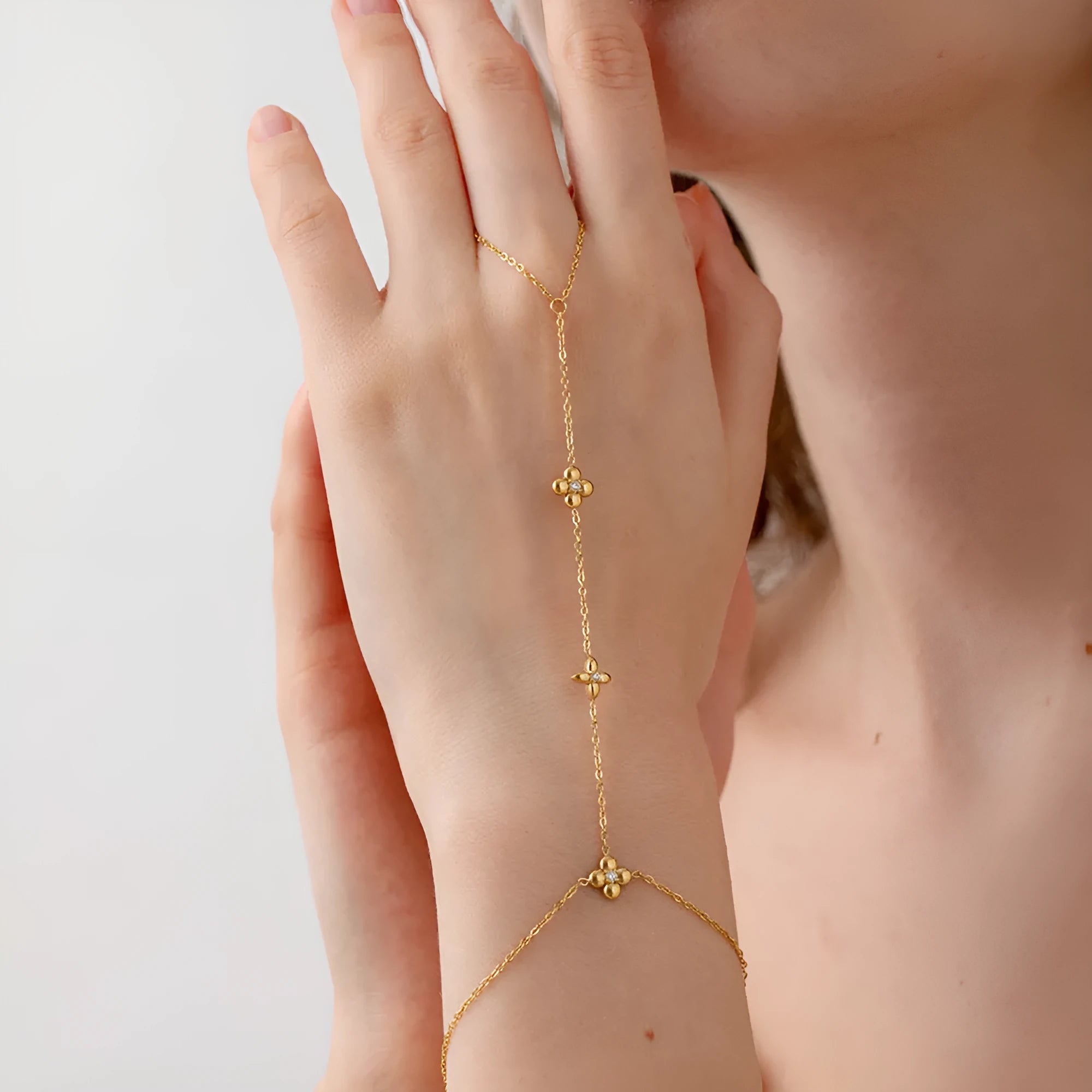 Gold stainless steel bracelet with eight-pointed stars and floral geometric design for women
