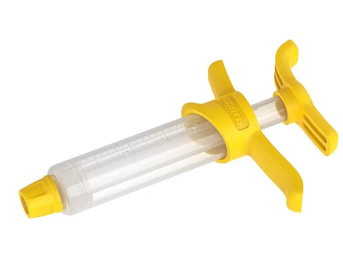 EZmtb bicycle hydraulic brake bleed kit showing syringes, funnels, adapters, and wrenches on a table