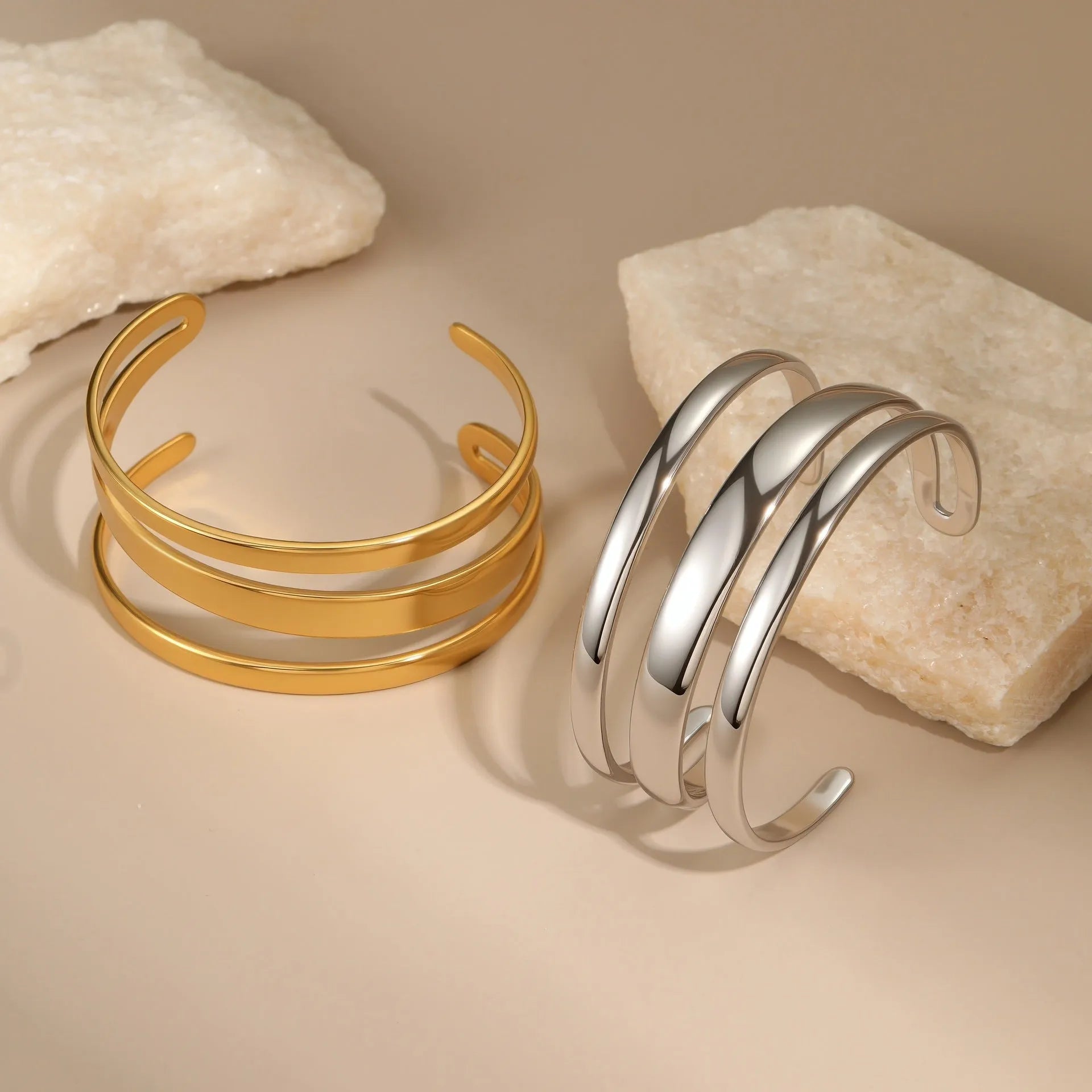 Stainless steel geometric line bracelet with simple opening clasp in gold or steel finish