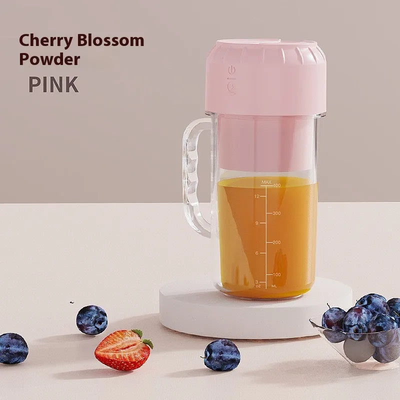 USB-powered portable personal juicer in cherry blossom pink or avocado green with selectable blade options
