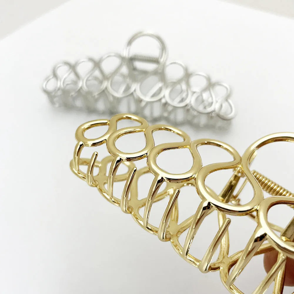Minimalist large alloy hair clip with electroplated gold or silver finish and tassel detailing for thick hair
