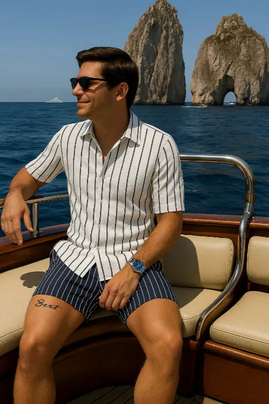 Men's beach shirt and shorts set in four-sided elastic fabric showing light mature casual styling