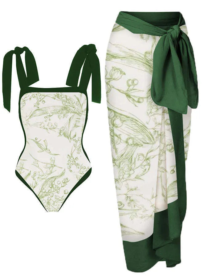Women's printed floral two-piece swimsuit with a matching chiffon hip skirt.