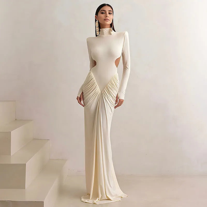 Long sleeve high collar slim fit dress with pleated backless detail in a solid colour