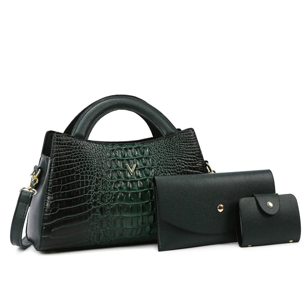 Women's black crocodile pattern PU leather crossbody bag with a single strap and front sandwich pocket.