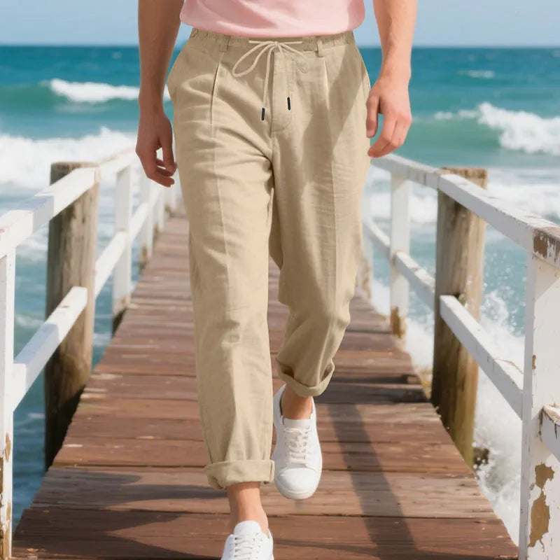 Men's casual linen trousers in light khaki colour with drawstring waist and straight leg