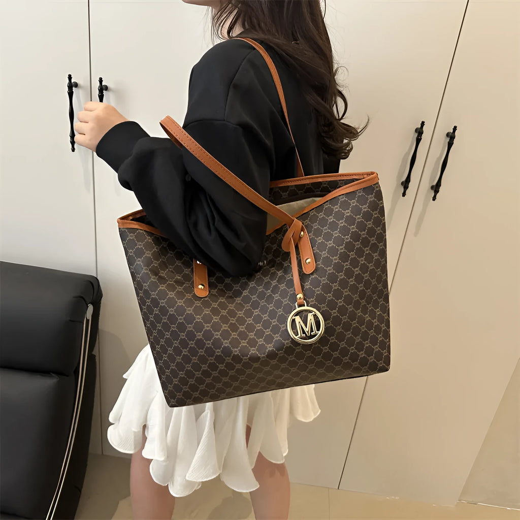 Western style PU leather shoulder bag showing sewing thread detailing, 42cm wide by 28cm tall, available in black, grey, white, and brown colours