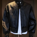 Men's extended length black PU leather jacket with litchi texture finish and business styling