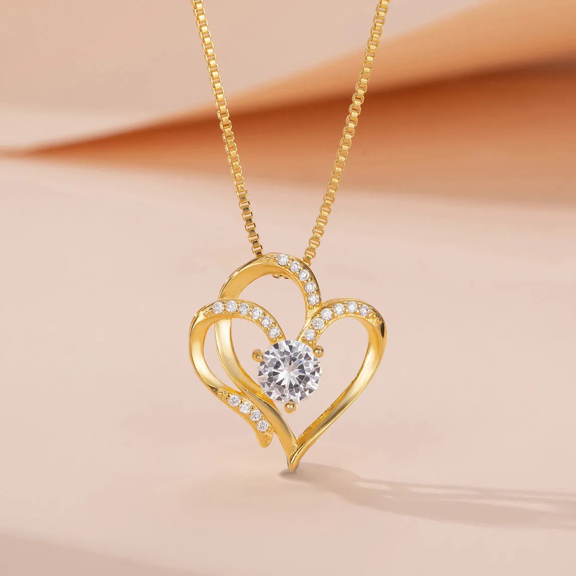 Women's heart-shaped pendant necklace in 925 silver with choice of platinum, gold, or rose gold finish.