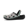 Black women's platform sandals with rhinestone hole design on the EVA upper.