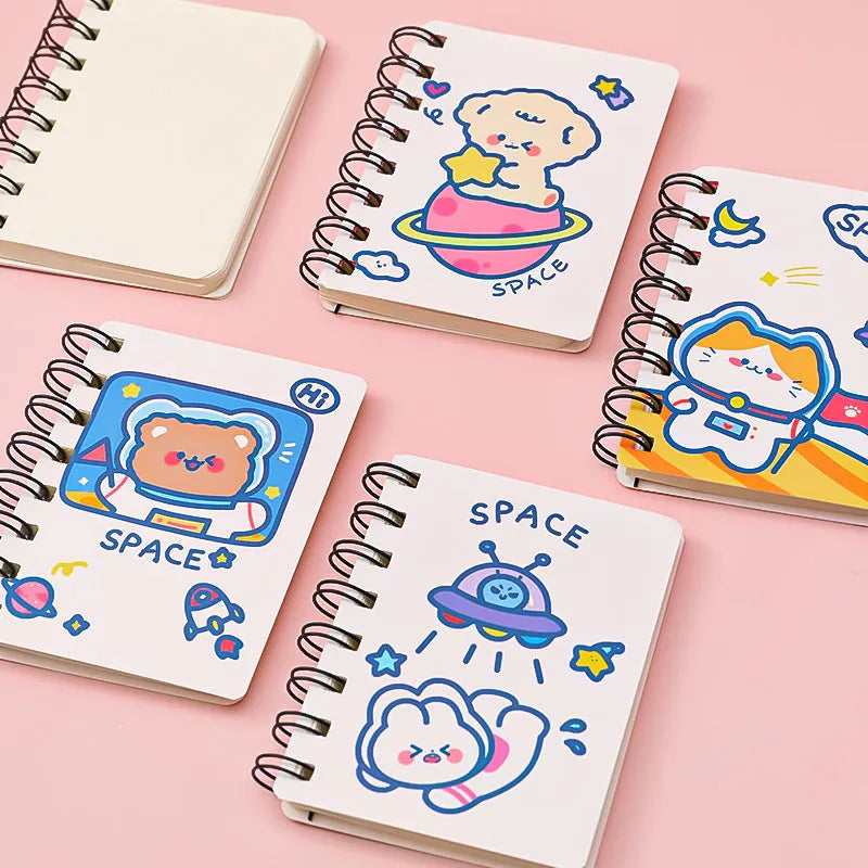 Astronaut themed flip-over pocket notebook showing 10.5cm by 8cm compact size
