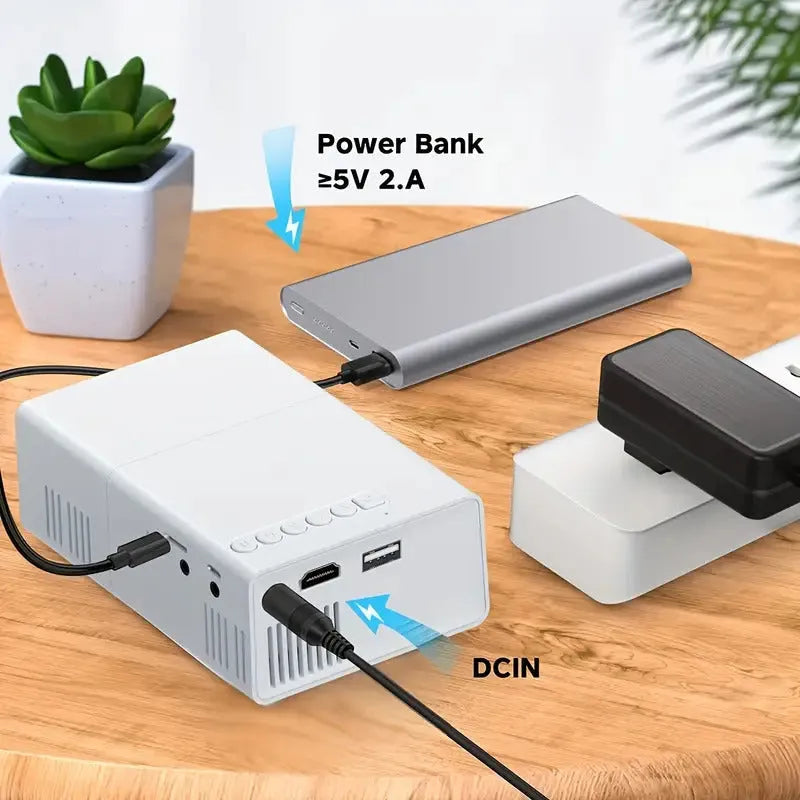 M100 mini LED portable digital projector in black or white with remote control and cables