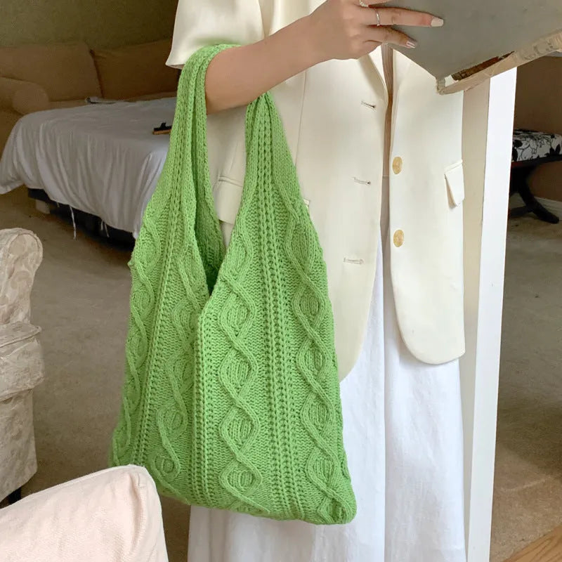 Retro style hollow knitted women's tote bag in a solid colour with double shoulder straps