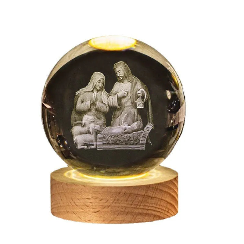 White crystal ball with cross and religious symbols on wooden LED base desk ornament