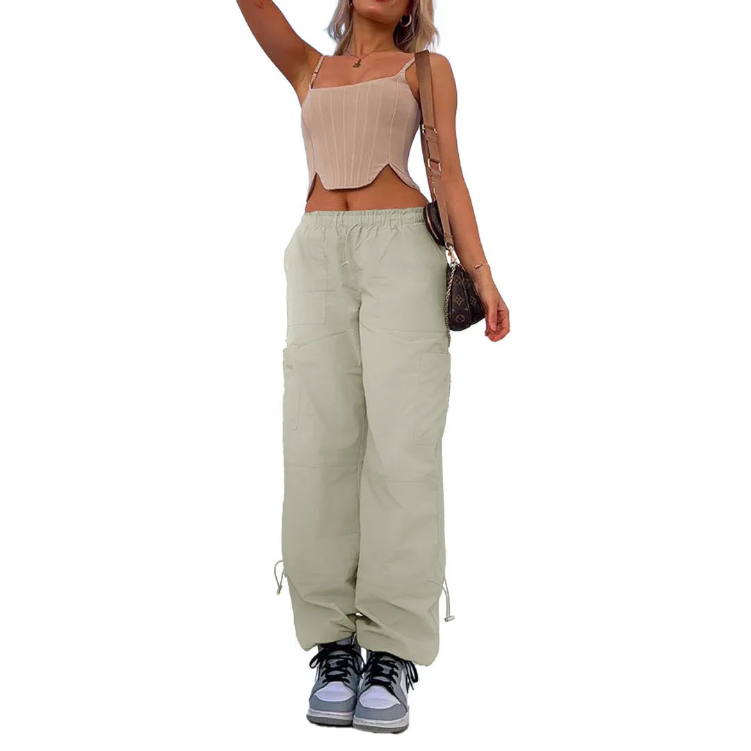 Men's straight-leg cargo trousers in khaki with multiple pockets, showing loose fit and mid-waist design