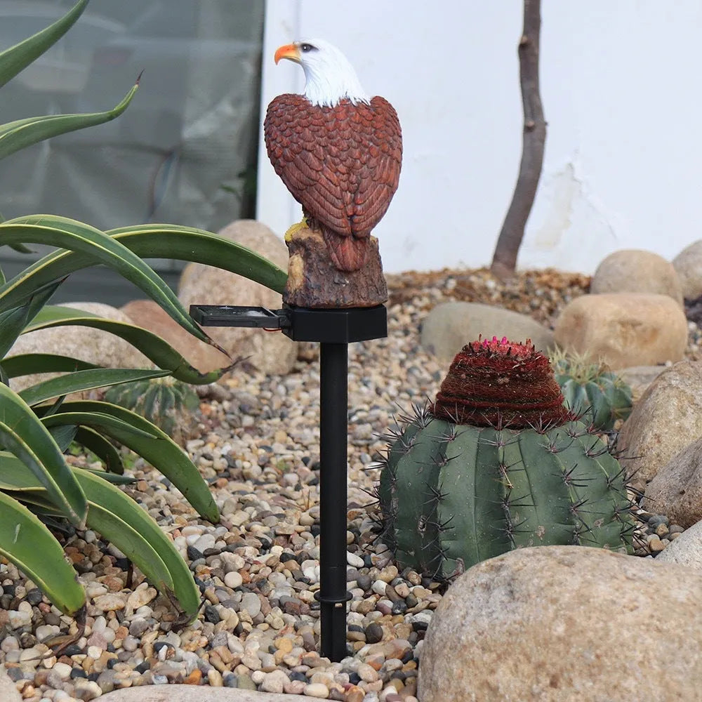 Solar resin eagle lawn lamp in garden setting with IP44 protection, 43.8cm tall