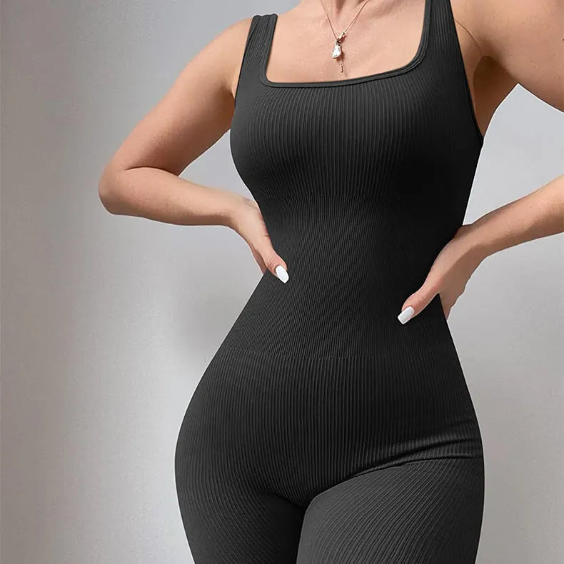 Women's beige spandex suspender tank top tights with button detail, shown at full length.