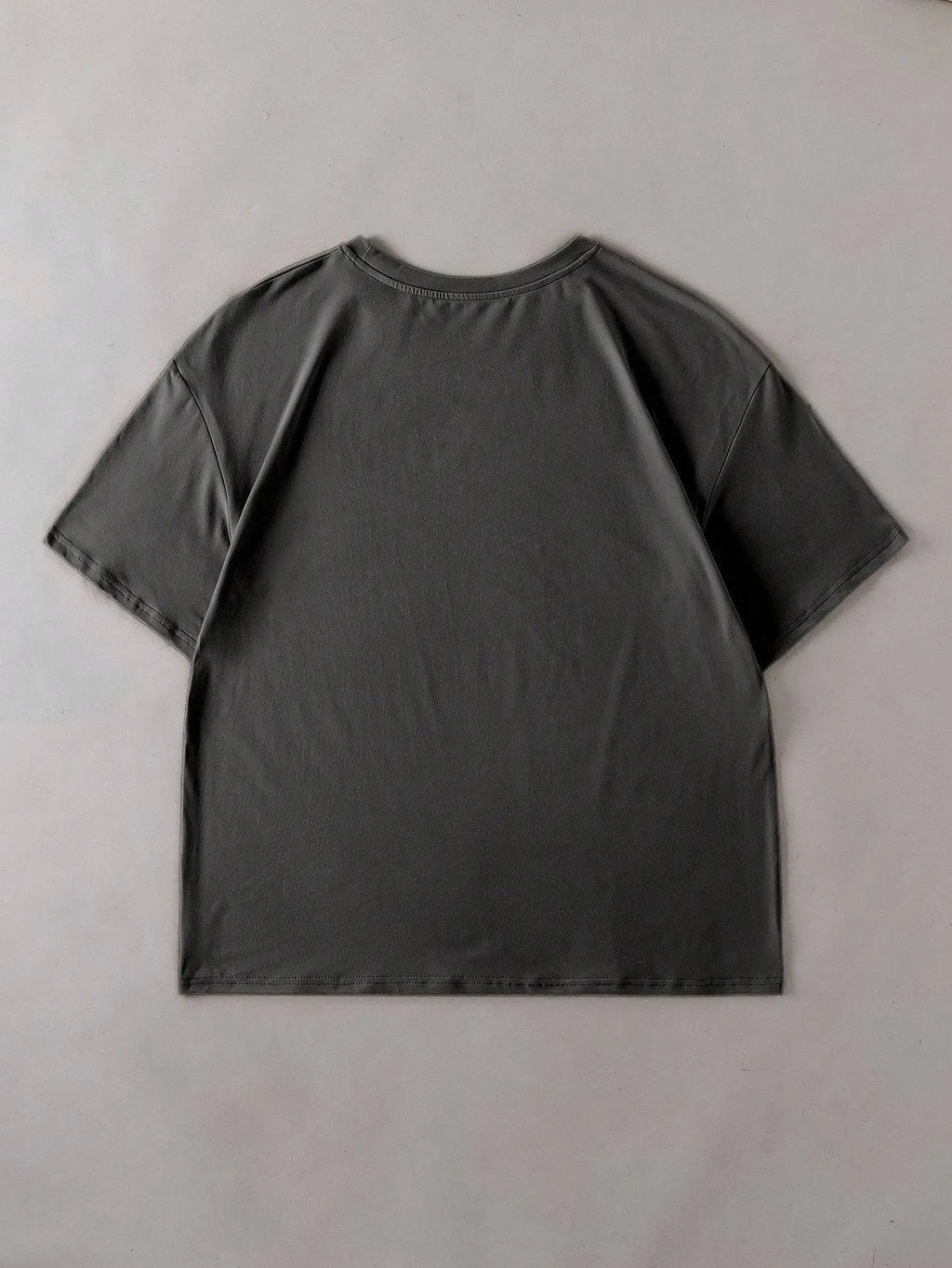 Loose fit cotton short sleeve t-shirt with round neck in black green grey or orange for men and women