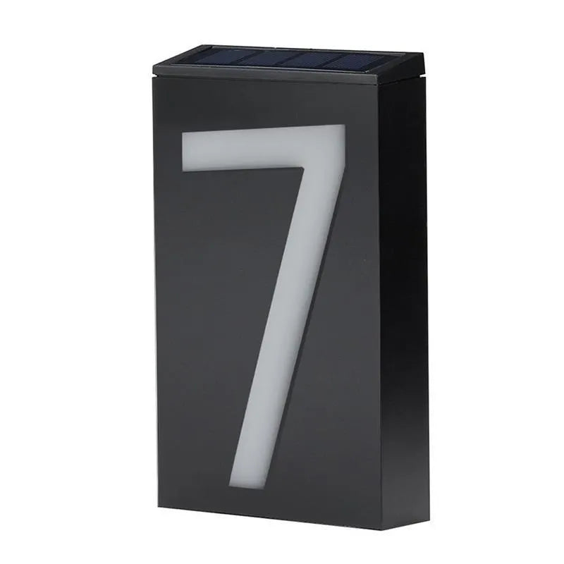 Solar powered white LED house number light mounted on a wall with IP65 waterproof rating