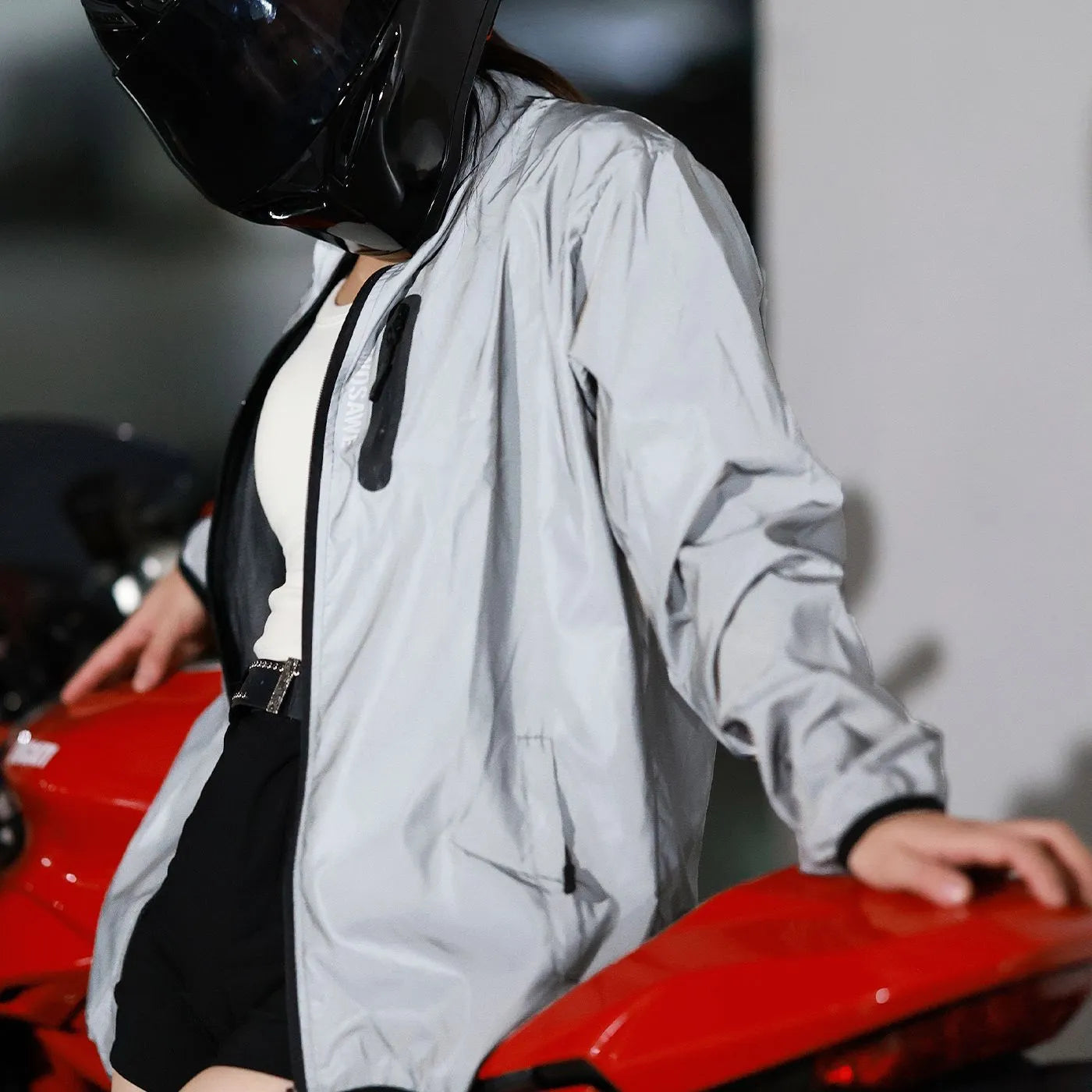 Silver waterproof polyester long sleeved top with windproof function on mannequin