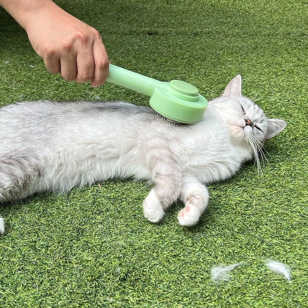 Green and yellow 2-in-1 pet grooming brush with curved teeth for long haired cats and shedding pets
