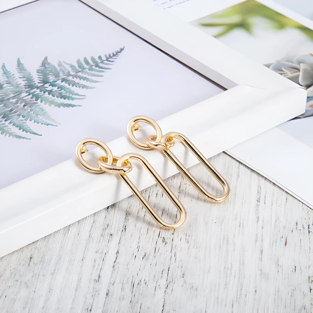 Sterling silver needle geometric hoop earrings with ring and line design elements