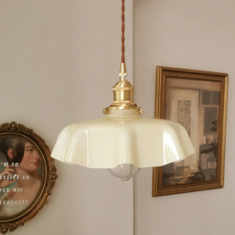 Medieval brass flower bud chandelier with adjustable height and five light colour options
