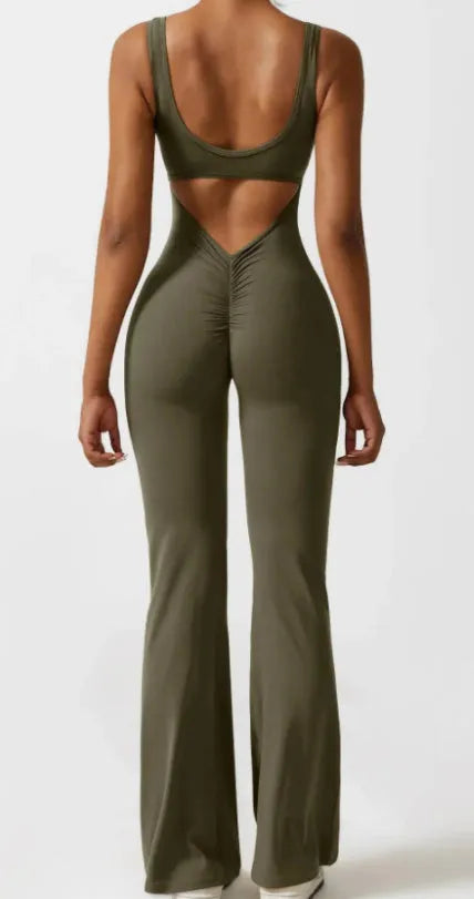 Women's black milk silk yoga bodysuit with seamless design and mid waist.