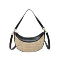 Hard woven straw dumpling-shaped crossbody bag in green with contrast stitching and a single shoulder strap.