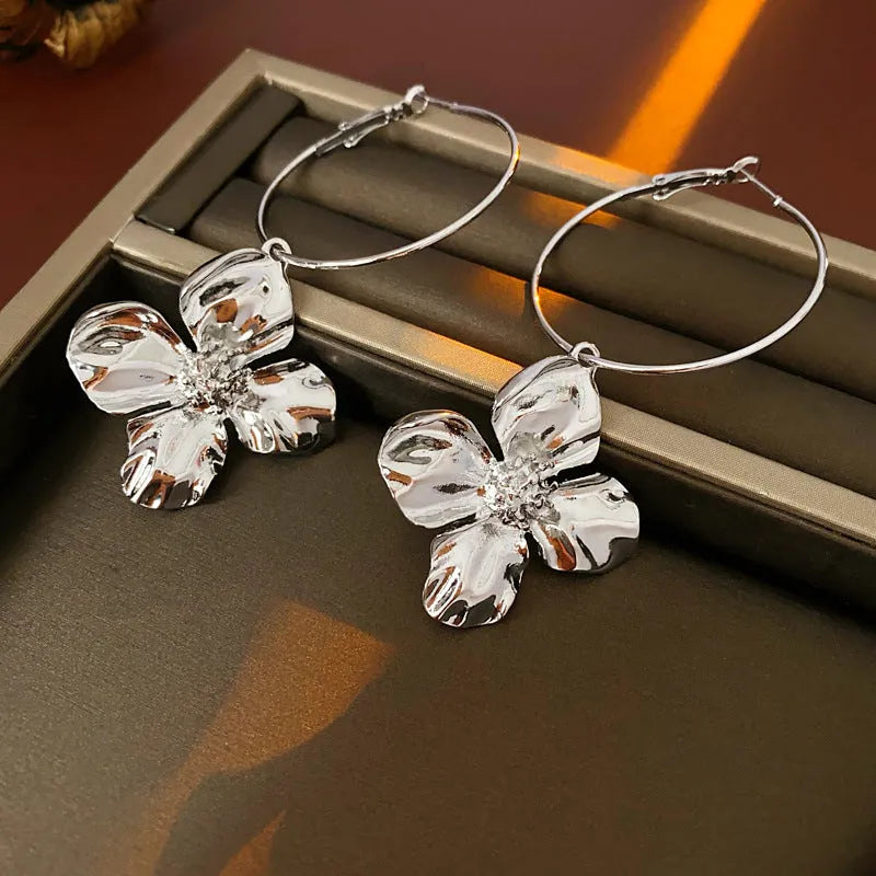 Silver needle metal flower earrings with geometric cold style in gold or silver electroplated finish