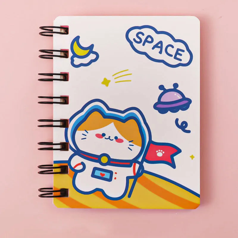 Astronaut themed flip-over pocket notebook showing 10.5cm by 8cm compact size