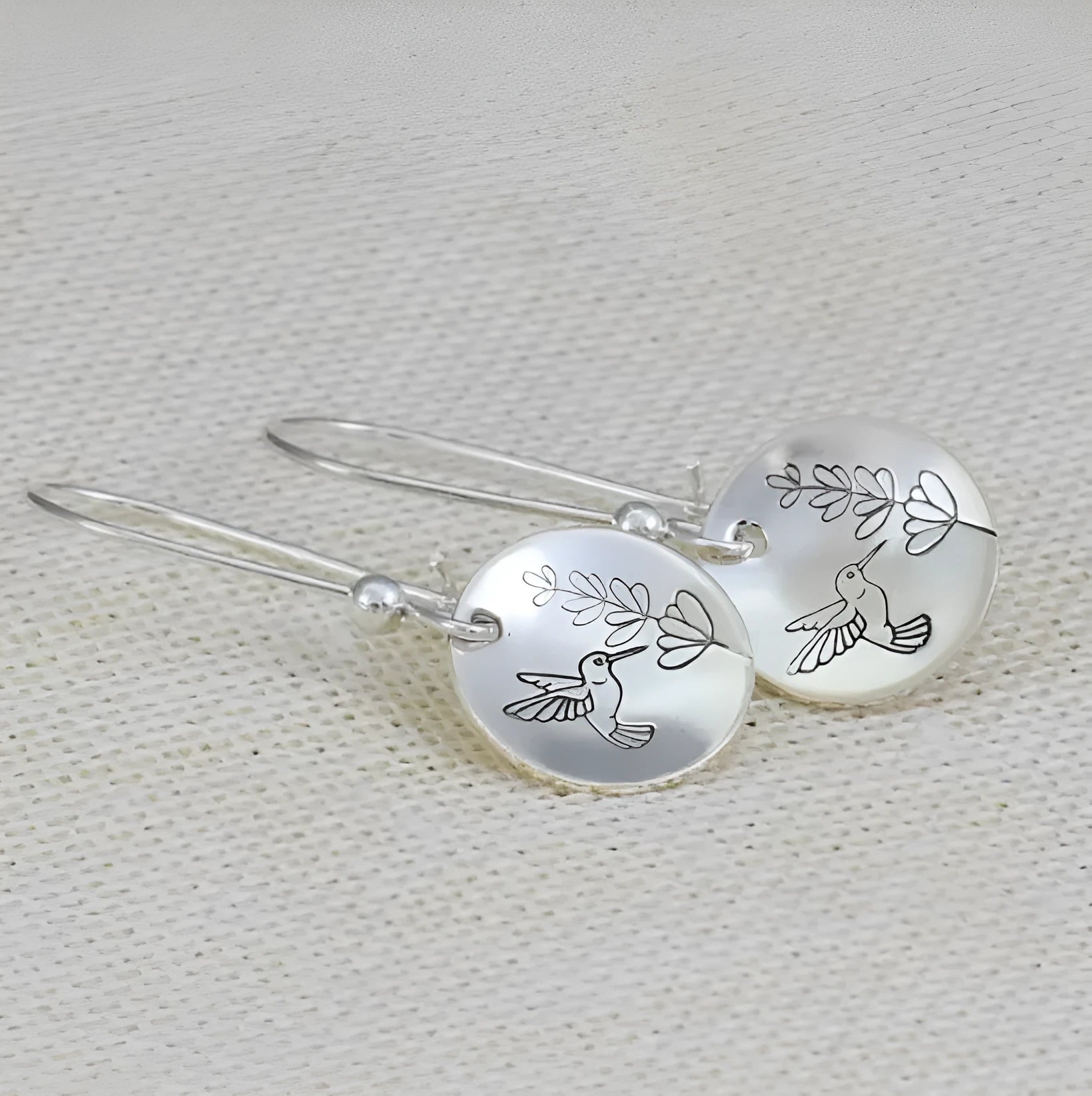 Glossy silver round women's earrings with retro bird and flower design