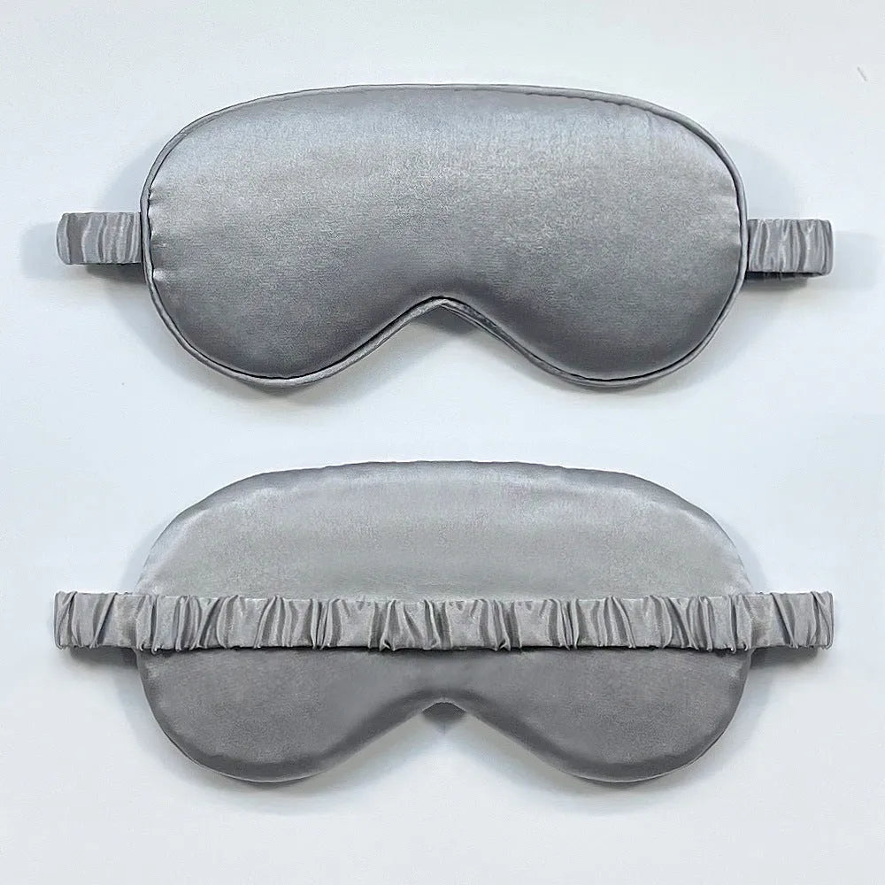 Reversible rayon satin sleep mask in a choice of colours with an elastic headband.