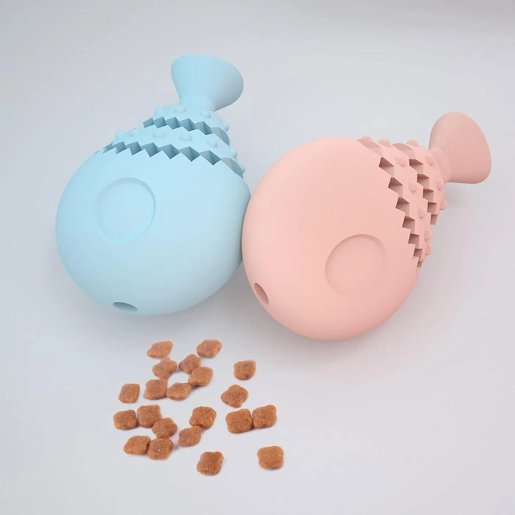 Blue fish bone shaped dog chew toy for teeth cleaning with a treat hole, shown next to a green and pink version.