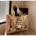 Women's large canvas tote bag with printed design options for travel and shopping.