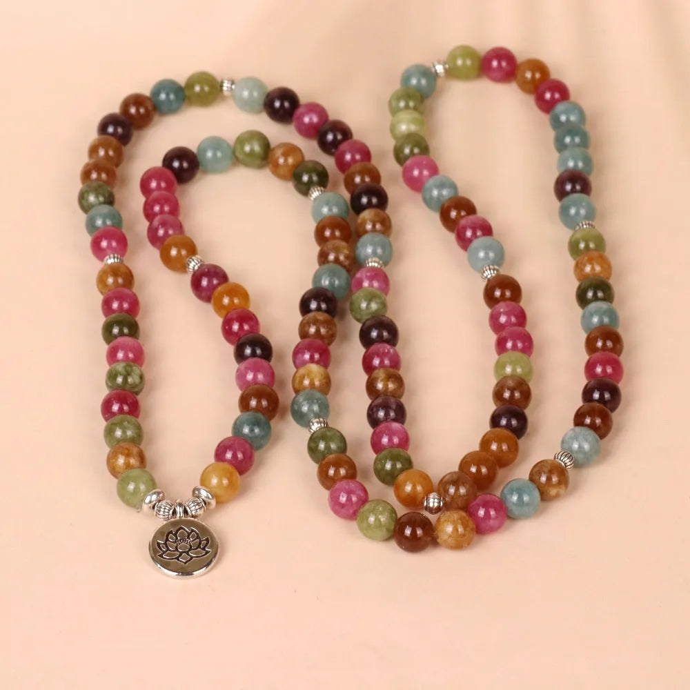 Multi-layer 108 bead bracelet with hanging lotus pendant in tourmaline colour