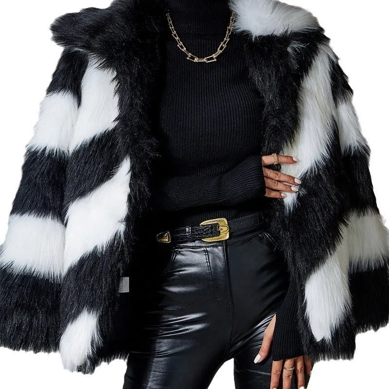 Minimalist women's faux fur coat with contrast colour lapel and a detachable fur collar.