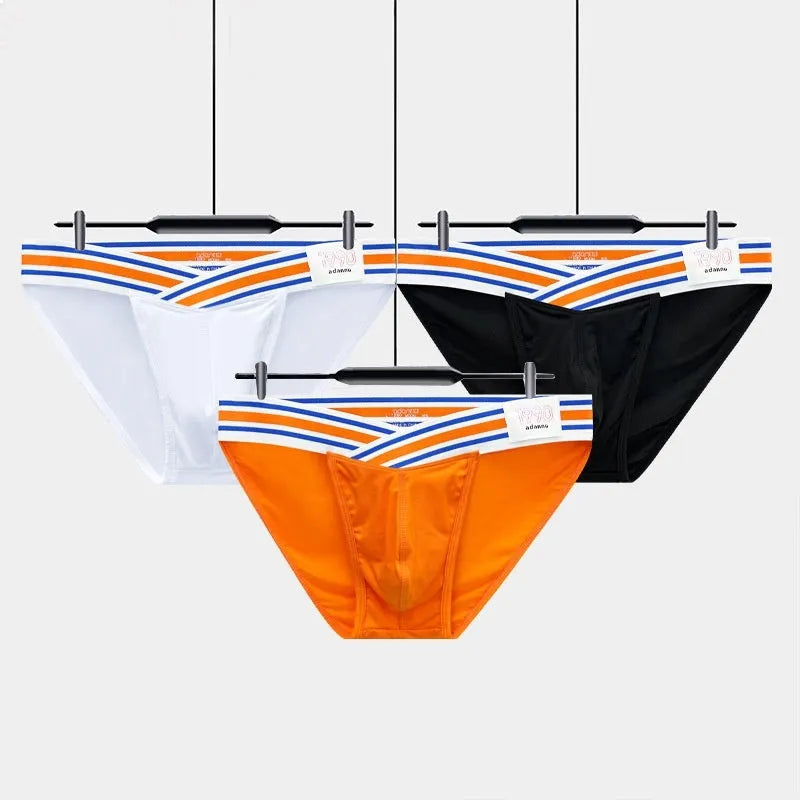 Solid color low waist cotton briefs for men with full package hip bulge design in black