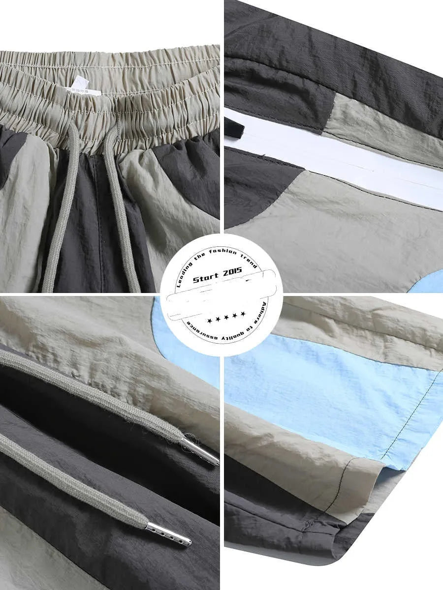 Blue patchwork quick-drying outdoor shorts with loose straight-leg design and elastic waistband