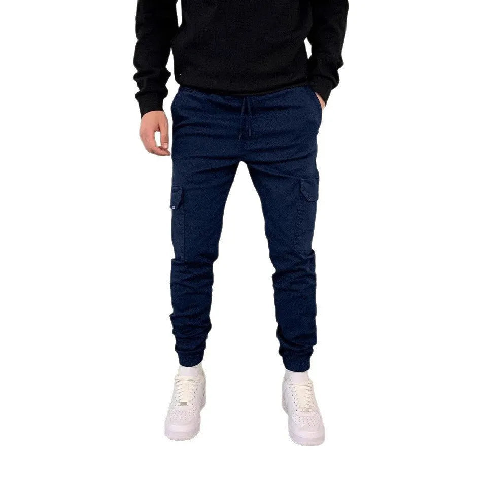 Men's loose fit casual trousers with dimensional patch pockets in light blue colour