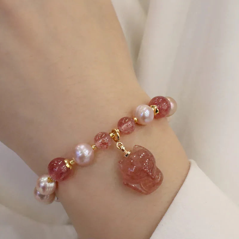 Women's natural freshwater pearl bracelet light pink colour with fox charm on wrist